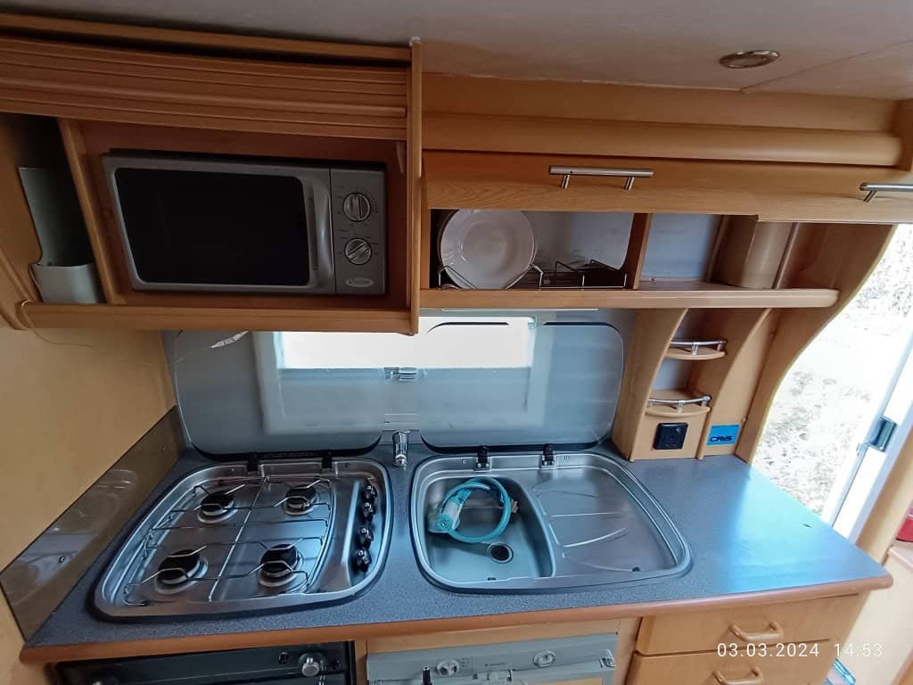 3–4 burner gas cooktop inside Elddis Crusader Aurora