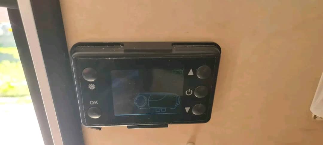 Air conditioning and heating control panel inside Jayco J Series Poptop