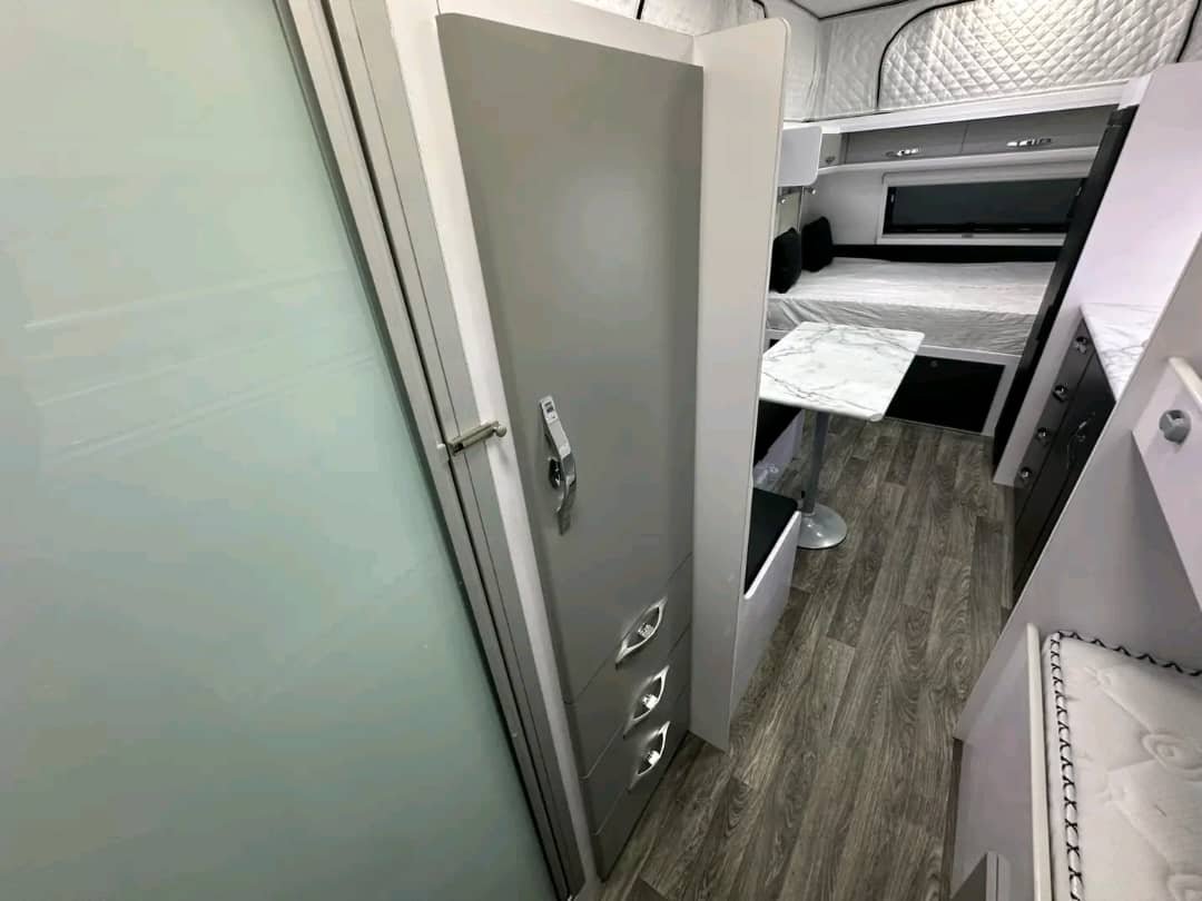 Interior walkthrough view of caravan bedroom