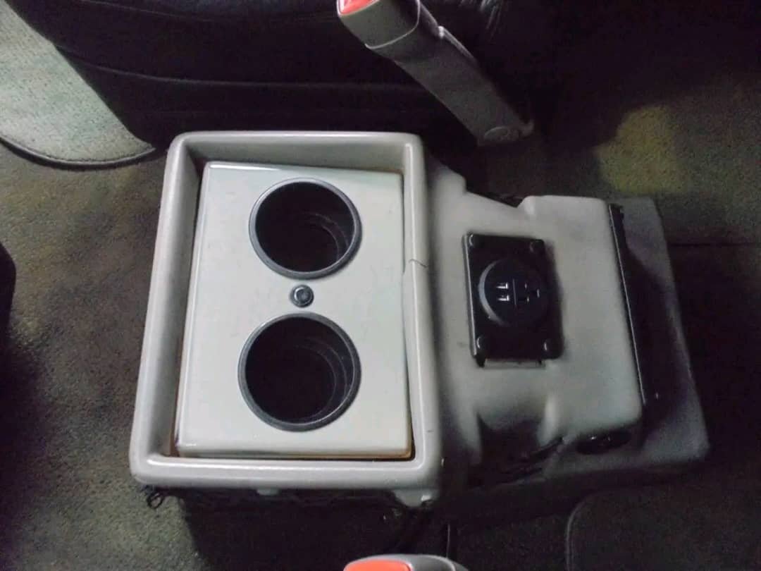 Cup holders and 12V power sockets inside Ram ProMaster Sherrod conversion