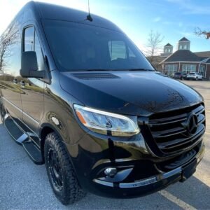 Custom front valence on blacked-out Mercedes Sprinter