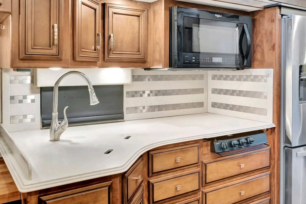 Dinette dining area with storage drawers in Canyon Star motorhome