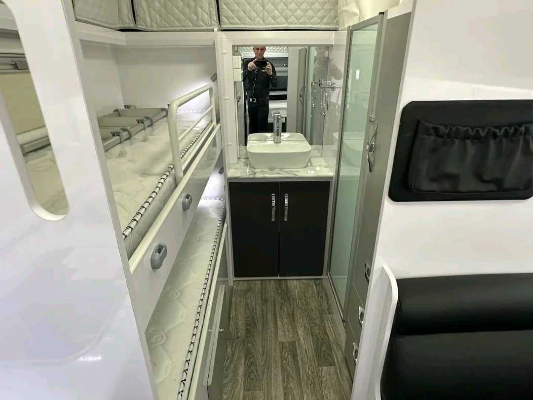 Full ensuite with shower, toilet and mirrored vanity