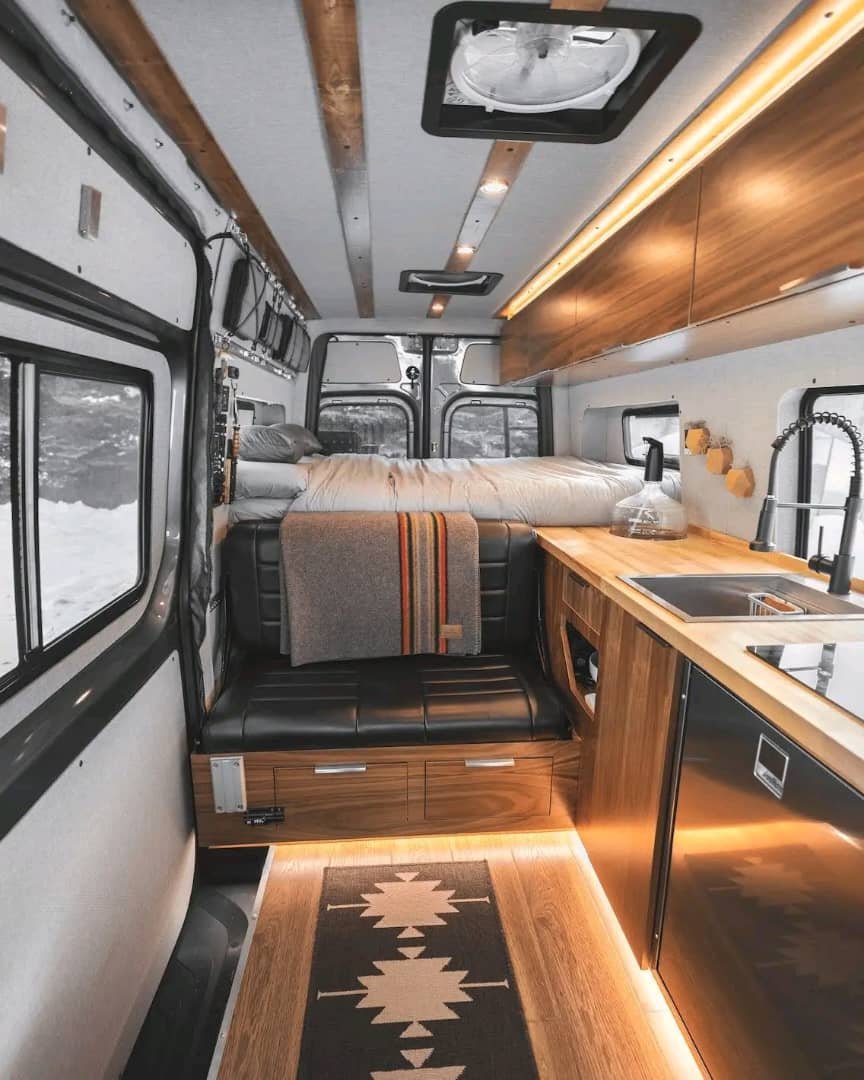 Full interior wide shot of Rossmönster Sprinter conversion