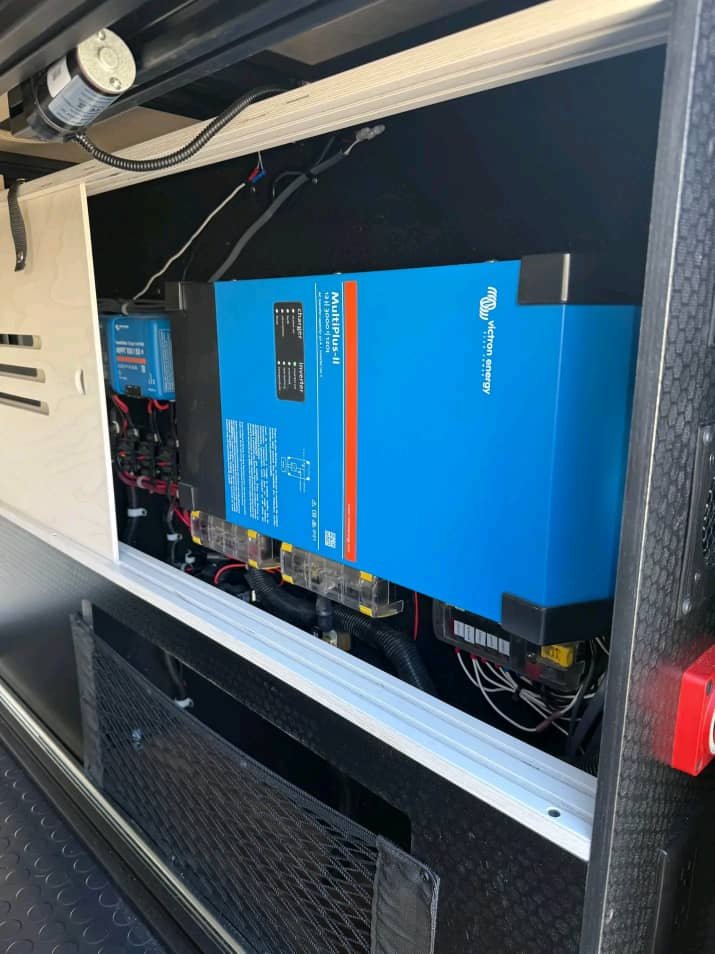 Off-grid battery management panel in Sprinter camper