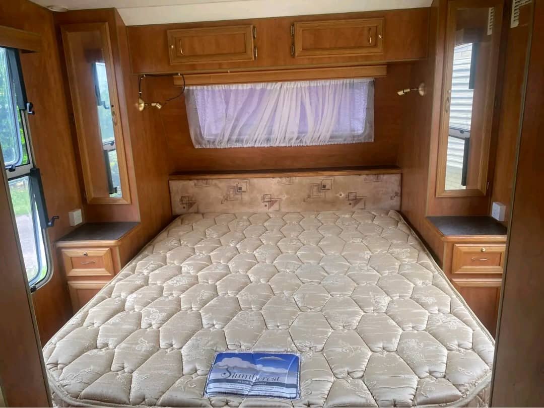 King-sized bed inside Regent 22ft caravan