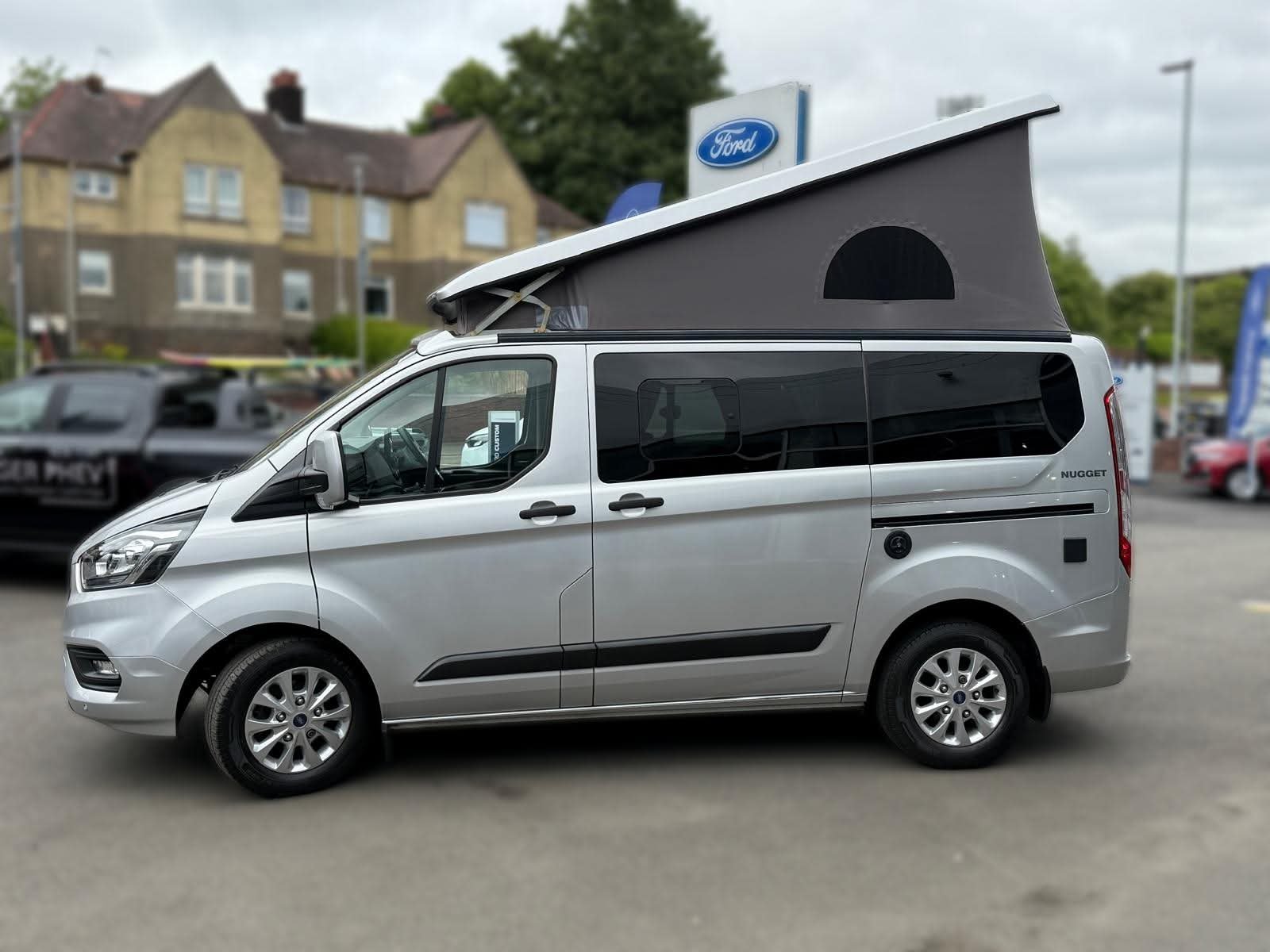 Left side exterior view of the 2025 Next-Gen Nugget campervan