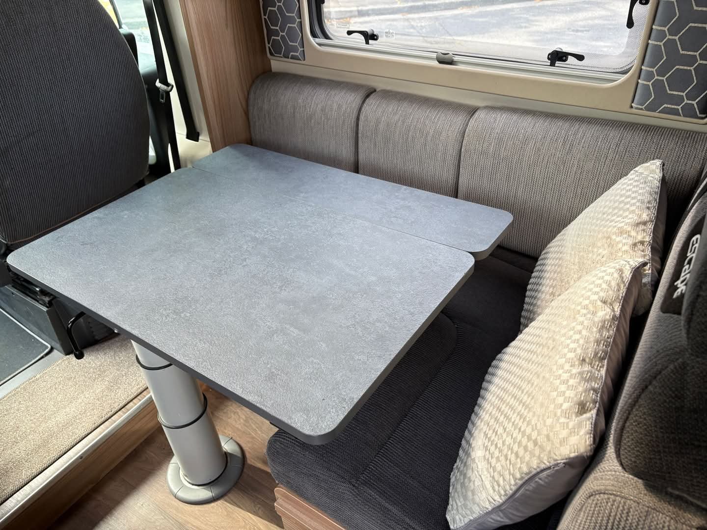 Lounge and dinette seating area in Swift Escape 674 motorhome