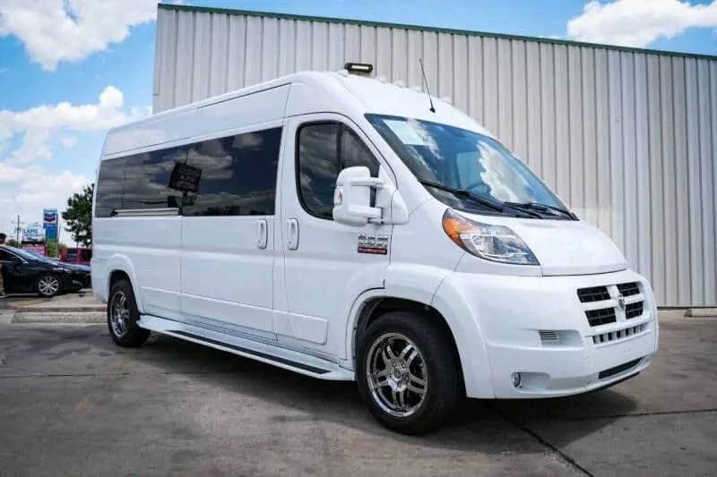 Front passenger-side angled view of Ram ProMaster conversion van