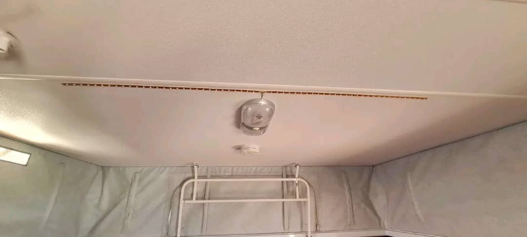 Poptop sleeping configuration in the Jayco J Series Caravan