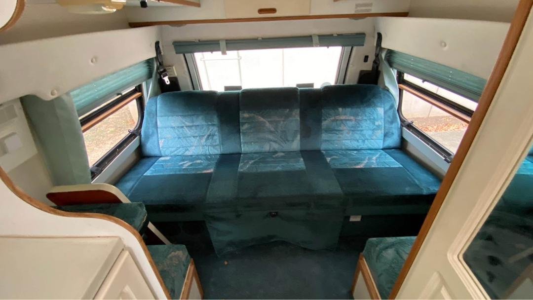 Rear lounge power sofa in Leisure Travel Widebody motorhome