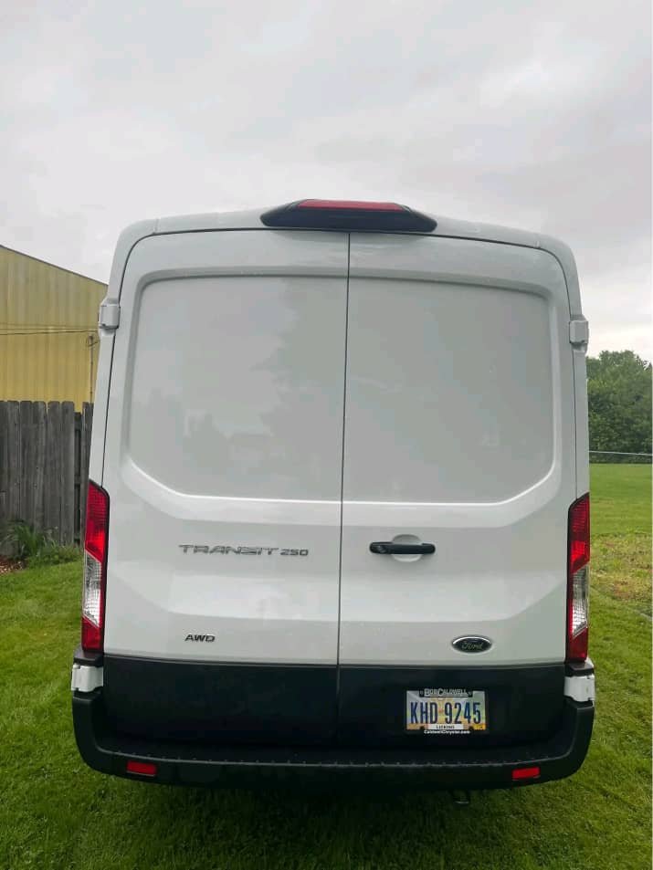 Straight rear view of Ram ProMaster campervan