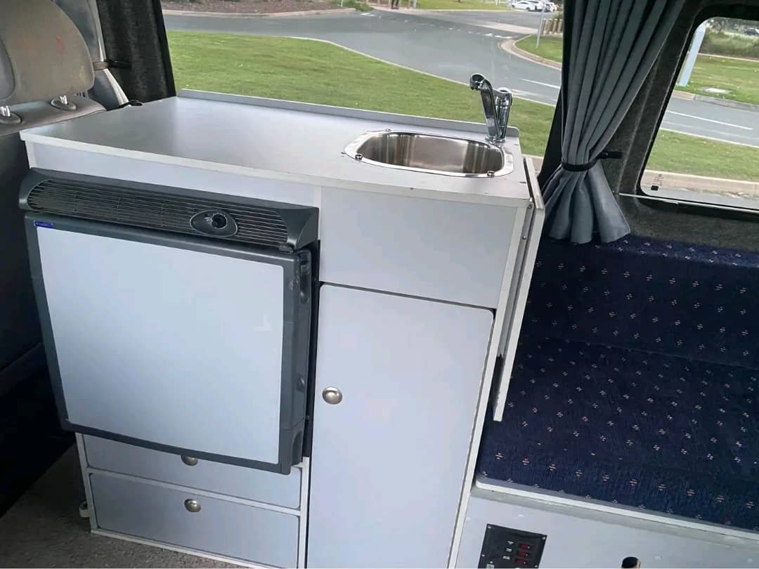 Closed metho stove inside campervan