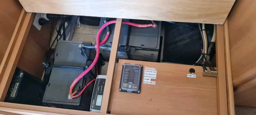 Dual 12V battery panel and lighting control switches in Jayco Poptop
