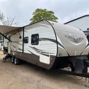 Front view of 2018 Wildwood travel trailer with slide-out extended