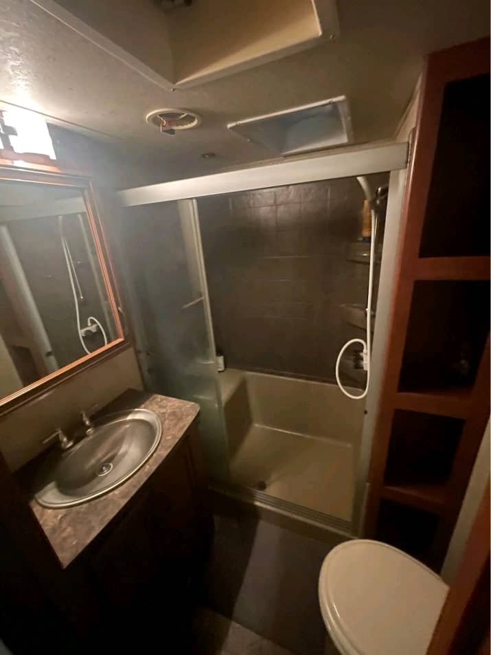 Secondary bathroom inside luxury motorhome