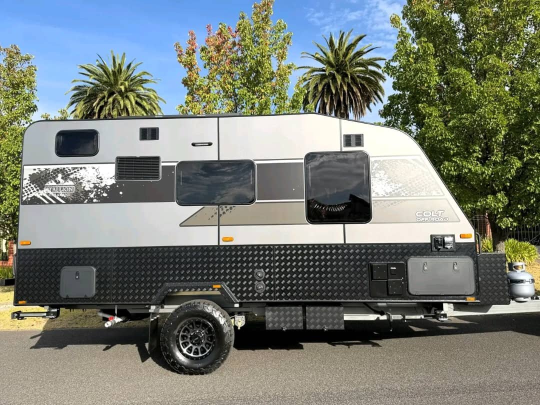 Aussie Traveller roll-out awning on Stallion Colt caravan