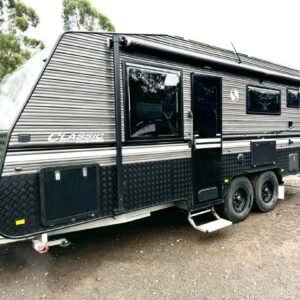 Alloy wheels and off-road tyres on 2023 Classic Tourer caravan with awning retracted on thw classic camper trailer​