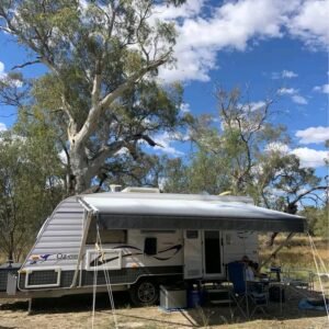 Brand-new awning with privacy screens on New Age caravan