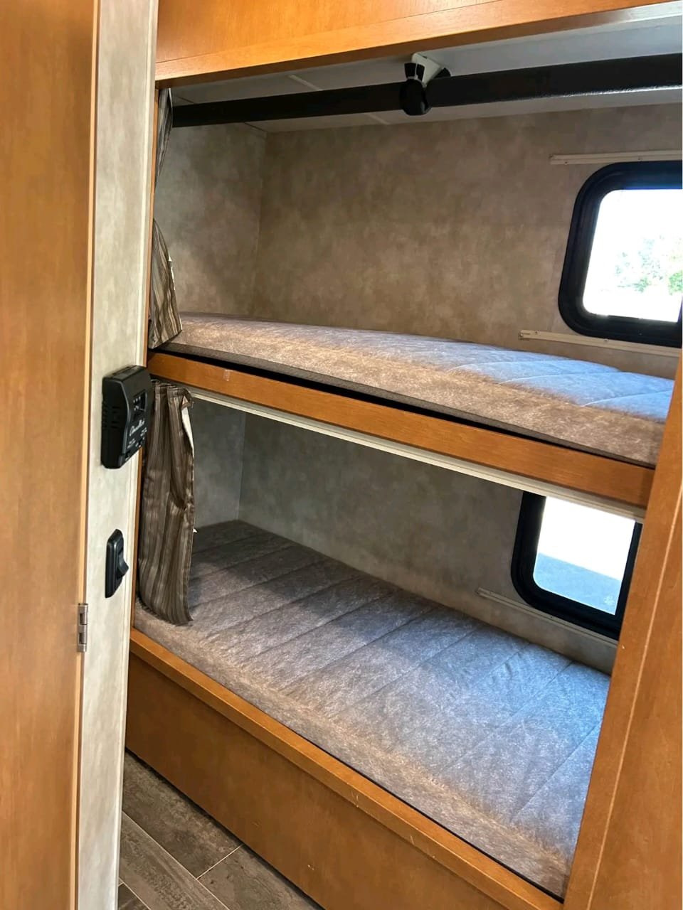 Built-in bunk beds inside Minnie Winnie 31G