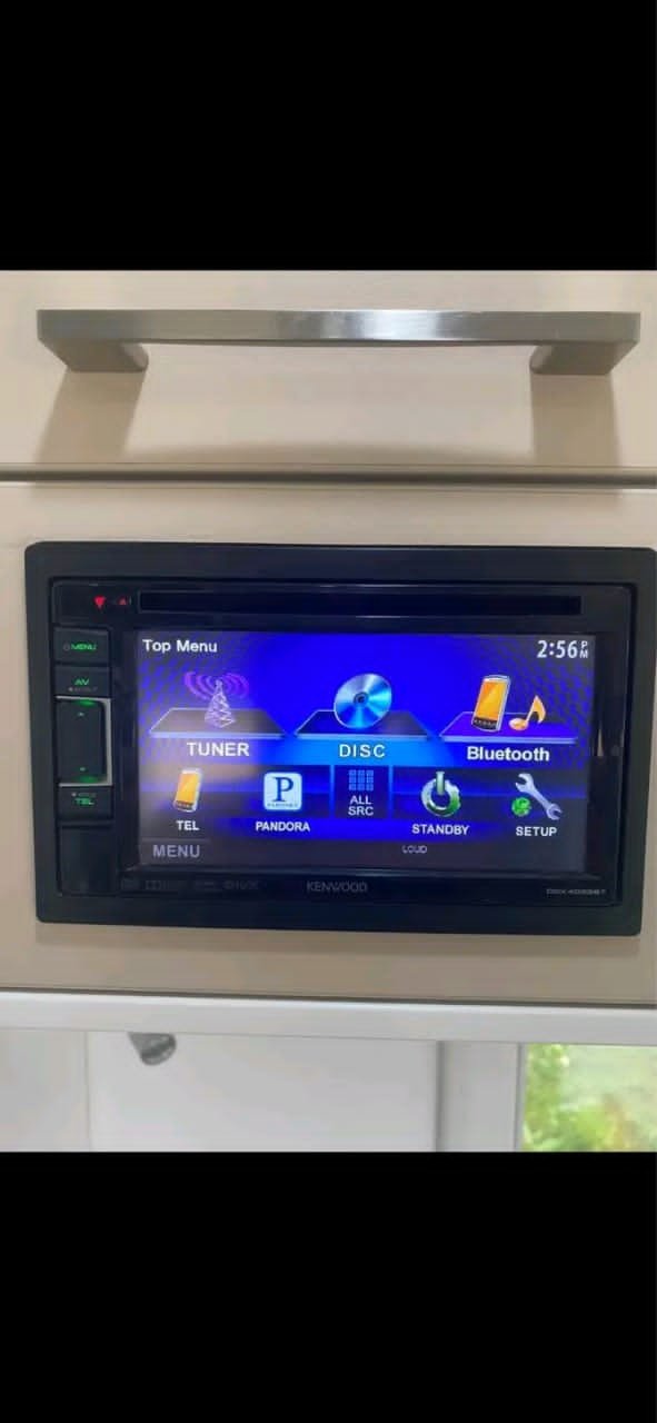 Bluetooth stereo control panel in New Age caravan