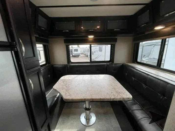 Dinette seating area inside Grand Design Imagine XLS