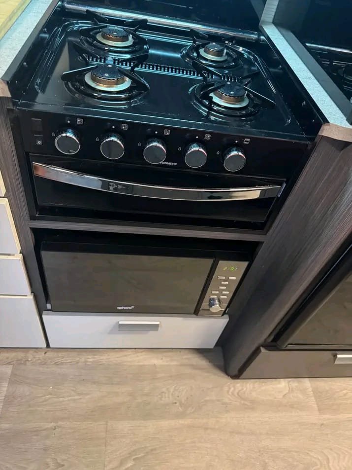 Dometic 4-burner gas cooktop and grill in Jayco Journey Outback