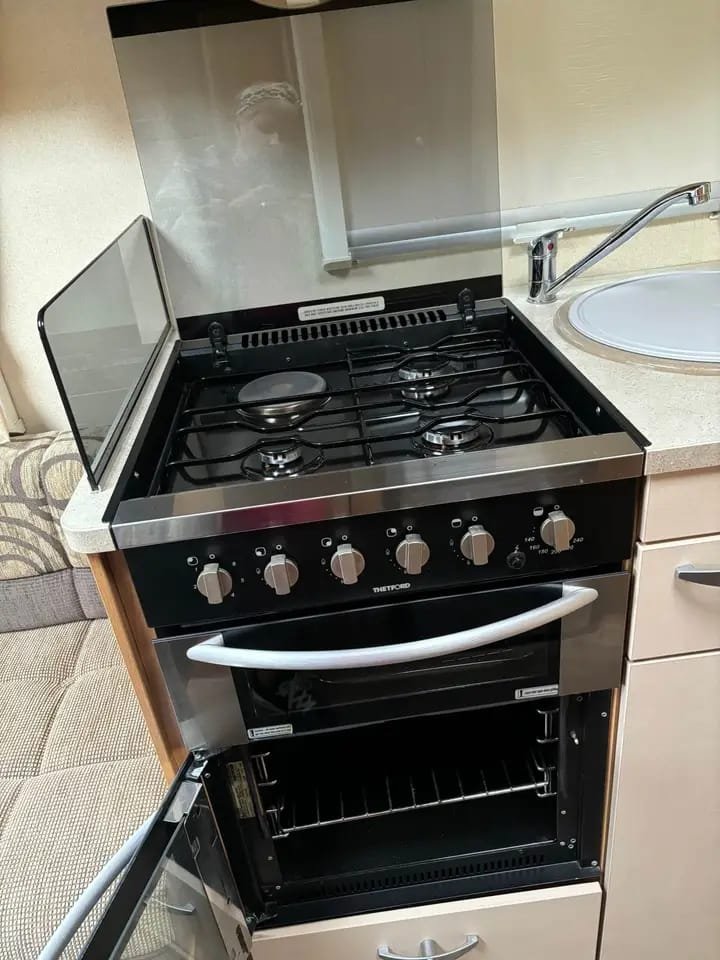 Full-size cooker inside 2011 compact motorhome