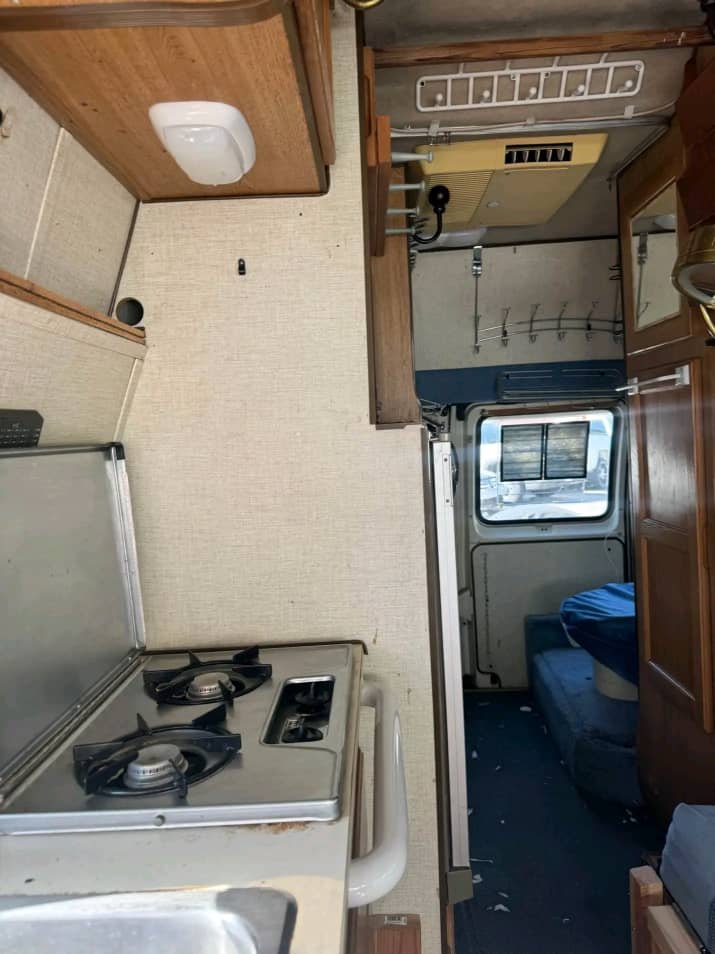 Kitchen area in 1990 Ford Econoline camper van