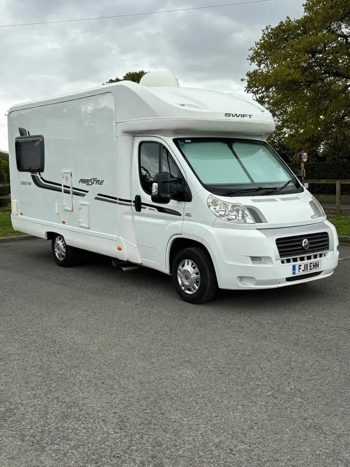Left angled side view of compact 2 berth motorhomes for sale