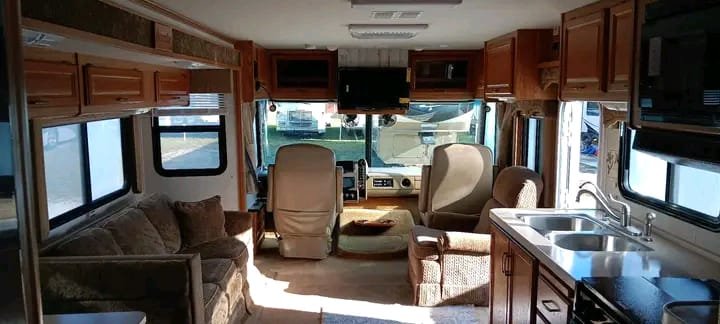 Passenger seat with seatbelt in Class A motorhome