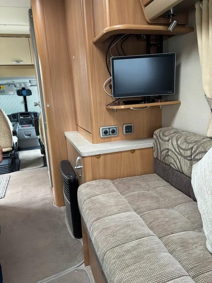 Lounge seating layout in compact 2-berth motorhome