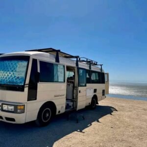 Exterior overview of Nissan Civilian camper bus nissan nv camper van conversion