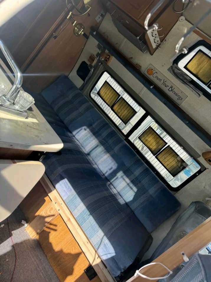 Seating lounge area in Ford Econoline camper van