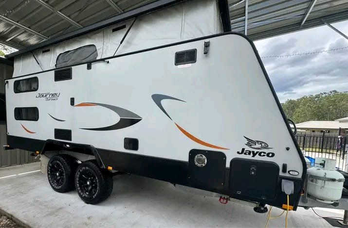 Rear exterior view of 2022 Jayco Journey Outback rvs with bunk beds