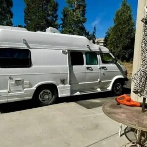Side view of 1999 Pleasure-Way Dodge 3500 dodge van rv​