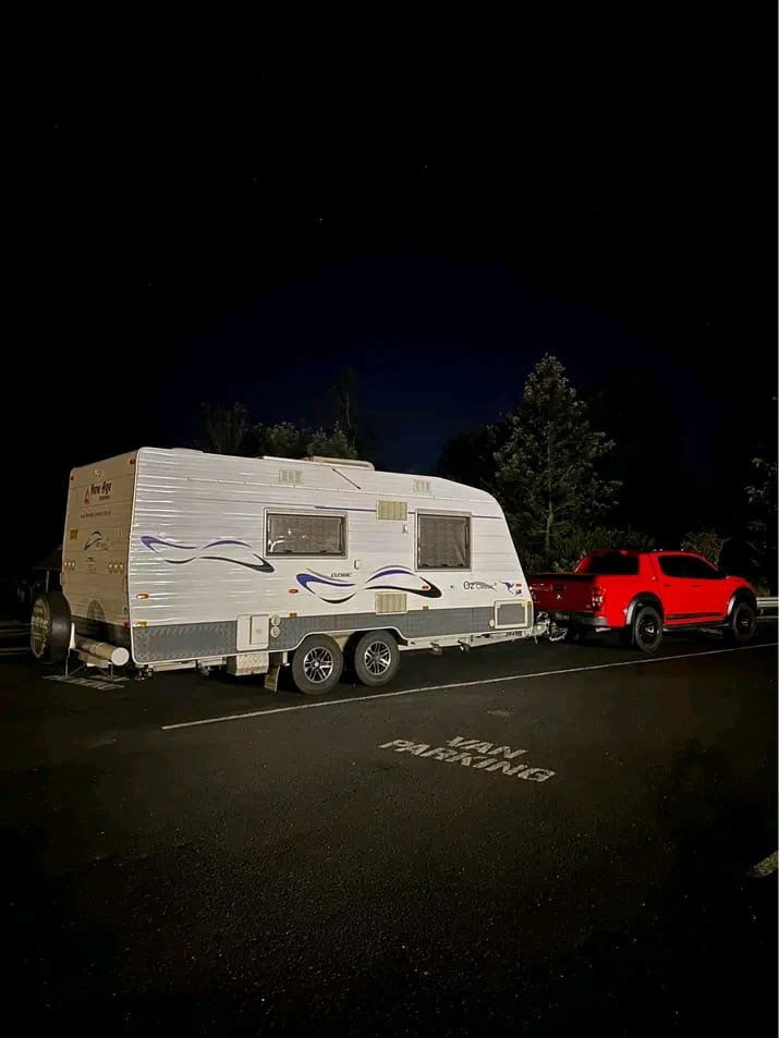 Side profile of 2014 New Age semi off-road caravan