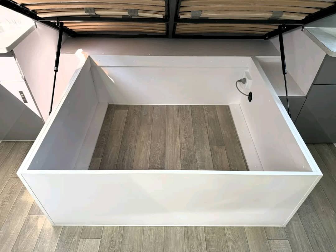 Under-bed storage and overhead cabinetry in Stallion Colt