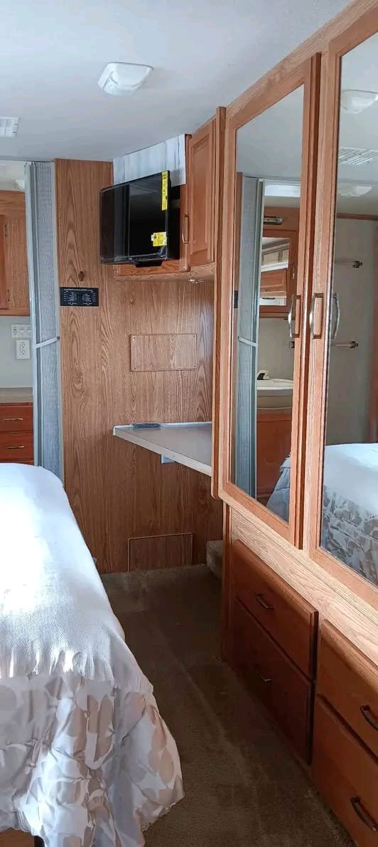 Walk-around queen bed in Fleetwood Bounder 35E motorhome