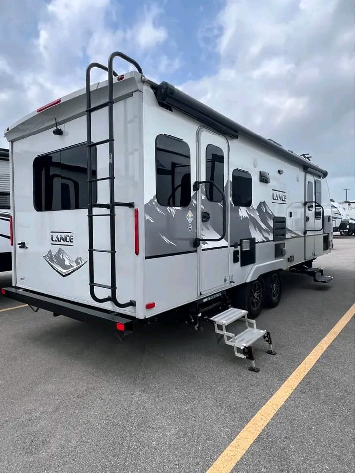 Rear exterior view of Lance 2375 with roof ladder