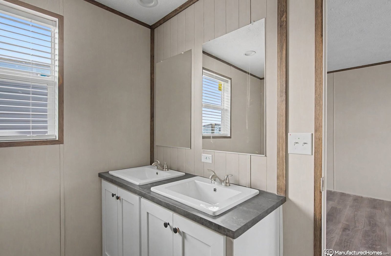 vanity and sink setup in manufactured home bathroom